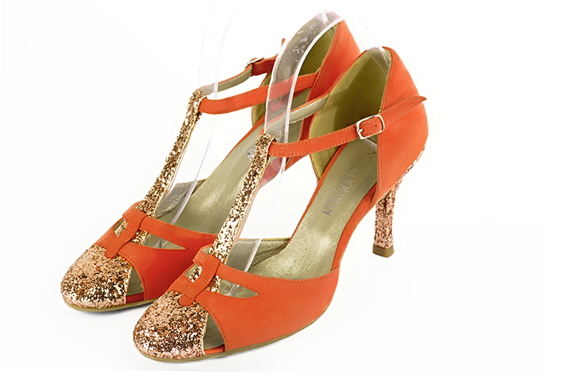 Chaussure femme à brides : Salomé côtés ouverts couleur or cuivré et orange clémentine. Bout rond. Talon haut fin Vue avant - Florence KOOIJMAN
