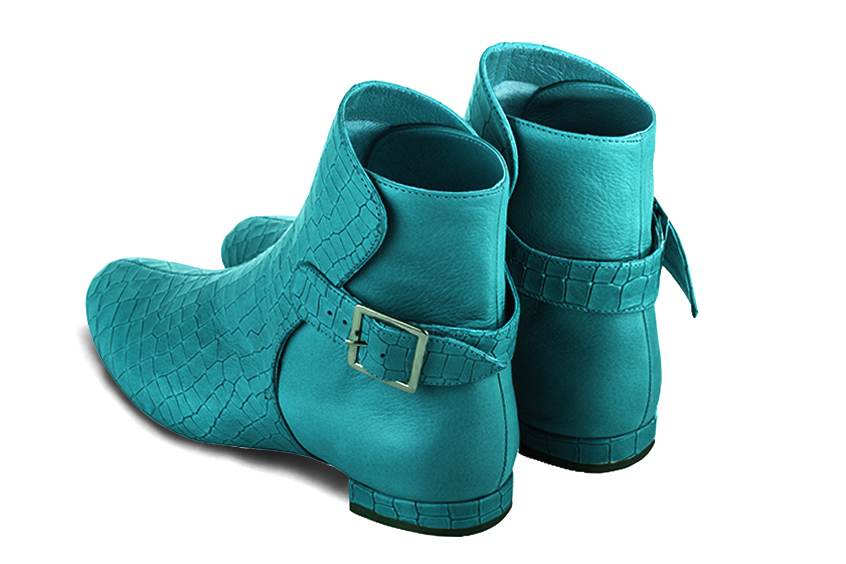 Boots femme : Boots avec des boucles à l'arrière couleur bleu turquoise. Bout rond. Talon plat bottier. Vue arrière - Florence KOOIJMAN