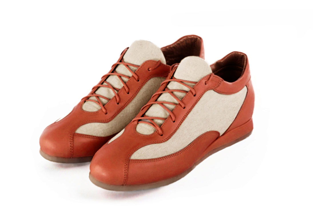 Basket femme habillée : Sneaker urbain bicolore couleur orange corail et beige naturel. Semelle fine. Doublure cuir Vue avant - Florence KOOIJMAN