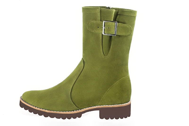 Boots femme : Boots avec des boucles sur le côté couleur vert pistache. Bout rond. Semelle gomme talon plat. Vue de profil - Florence KOOIJMAN