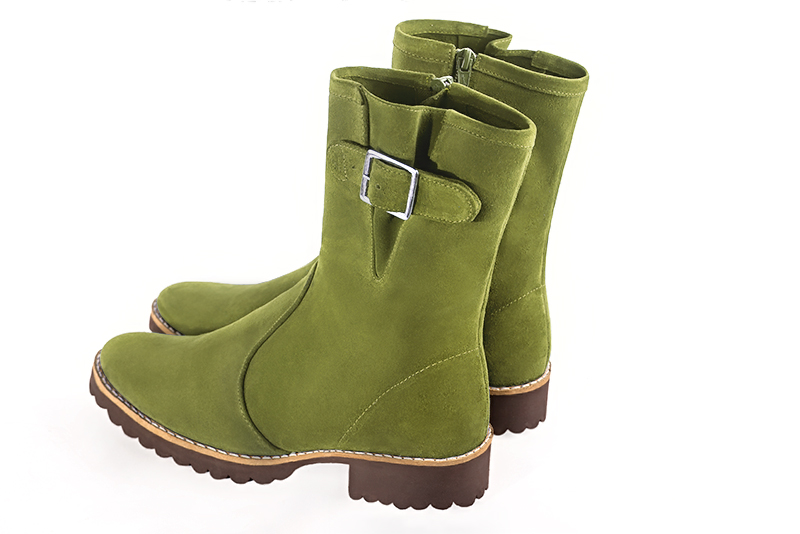 Boots femme : Boots avec des boucles sur le côté couleur vert pistache. Bout rond. Semelle gomme talon plat. Vue arrière - Florence KOOIJMAN