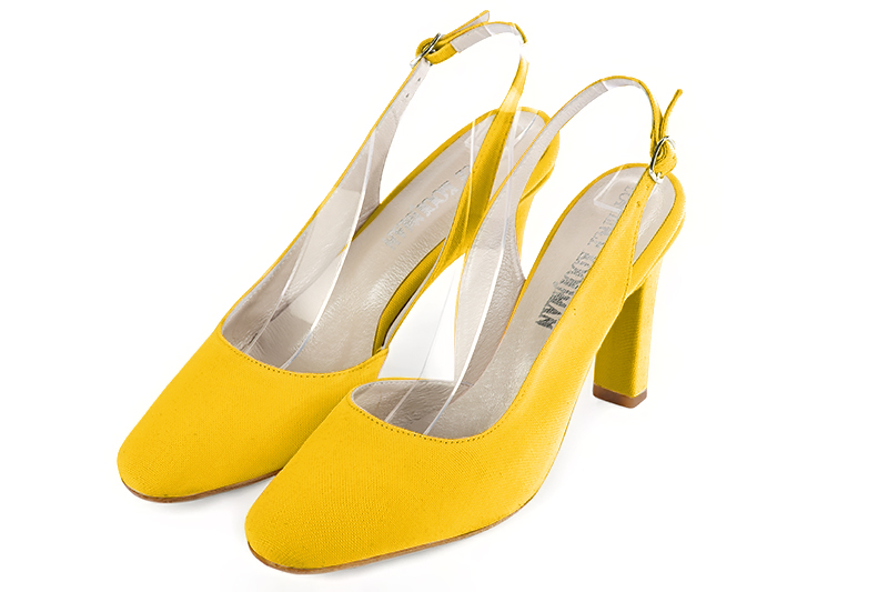 Chaussure femme à brides :  couleur jaune soleil. Bout rond. Talon haut trotteur Vue avant - Florence KOOIJMAN