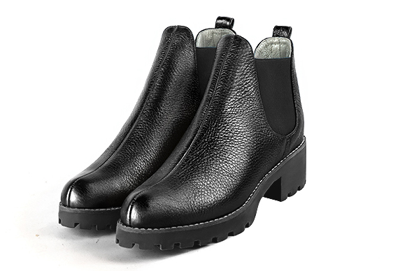 Boots femme : Boots élastiques sur les côtés couleur noir satiné. Bout rond. Semelle gomme petit talon Vue avant - Florence KOOIJMAN