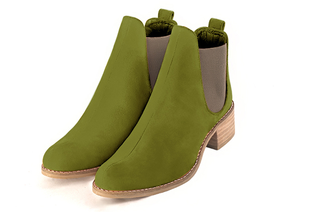 Boots femme : Boots élastiques sur les côtés couleur vert pistache et beige mastic. Bout rond. Semelle cuir petit talon Vue avant - Florence KOOIJMAN