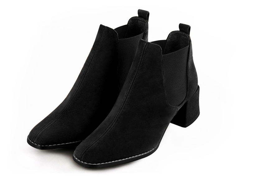 Boots femme : Boots élastiques sur les côtés couleur noir mat. Bout carré. Talon mi-haut bottier Vue avant - Florence KOOIJMAN