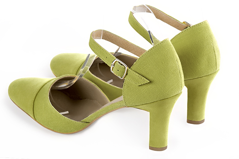 Chaussure femme à brides : Chaussure côtés ouverts bride cou-de-pied couleur vert pistache. Bout rond. Talon haut trotteur. Vue arrière - Florence KOOIJMAN
