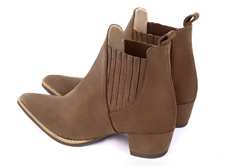 Boots femme : Boots élastiques sur les côtés couleur marron chocolat. Bout effilé. Petit talon conique. Vue arrière - Florence KOOIJMAN