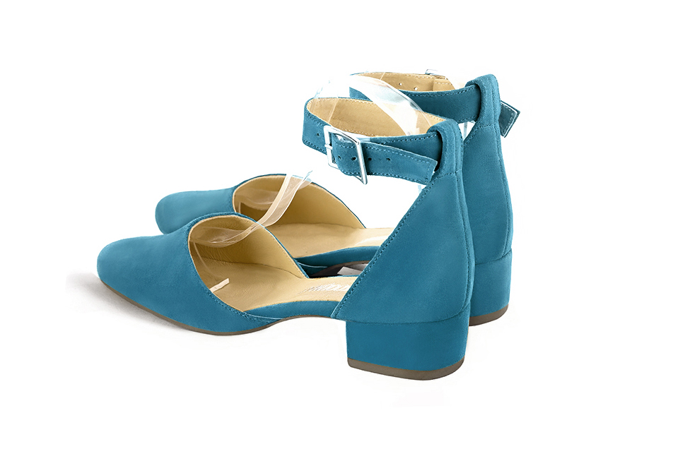 Chaussures bride cheville femme ouvertes sur les côtés bleu canard. Bout rond. Talon bottier de 3.5 cm - Vue arrière