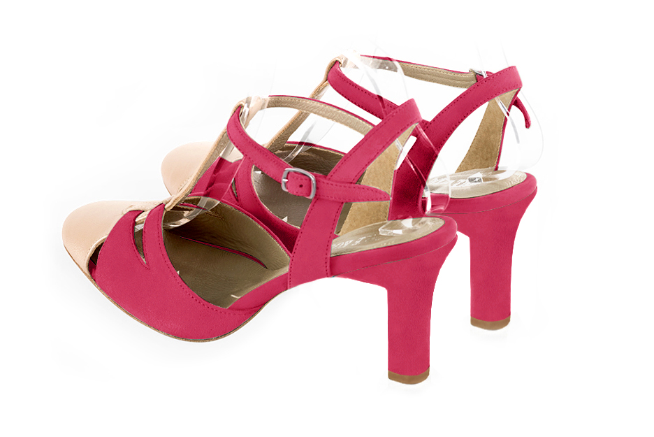 Chaussure femme à brides : Salomé ouverte à l'arrière couleur or doré et rose fuchsia. Bout rond. Talon haut trotteur. Vue arrière - Florence KOOIJMAN