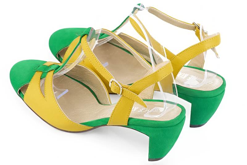 Chaussure femme à brides : Salomé ouverte à l'arrière couleur vert émeraude et jaune soleil. Bout rond. Talon mi-haut virgule. Vue arrière - Florence KOOIJMAN