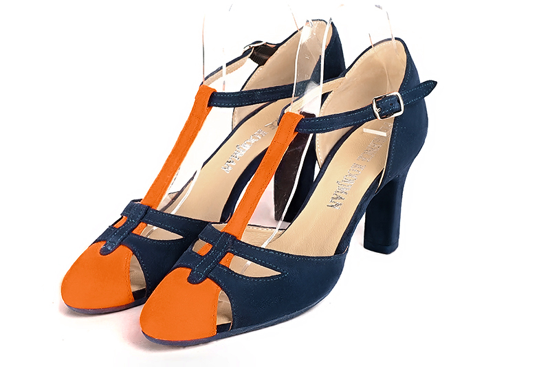 Chaussure femme à brides : Salomé côtés ouverts couleur orange clémentine et bleu marine. Bout rond. Talon haut trotteur Vue avant - Florence KOOIJMAN