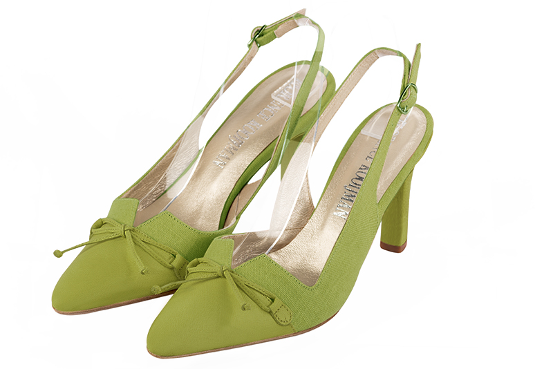 Escarpins habillés, élégants et raffinés, ouverts à l'arrière avec un noeud sur l'avant, coloris vert pistache. Bout effilé. Haut. Talon fin. Cérémonie, soirée, cocktail, évènementiel. Personnalisation : Choix des cuirs, 
                des couleurs et des talons. Petites et grandes pointures. - Florence KOOIJMAN