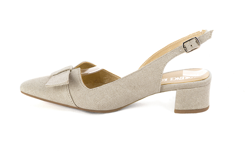 Chaussure femme à brides :  couleur or doré. Bout effilé. Petit talon évasé. Vue de profil - Florence KOOIJMAN