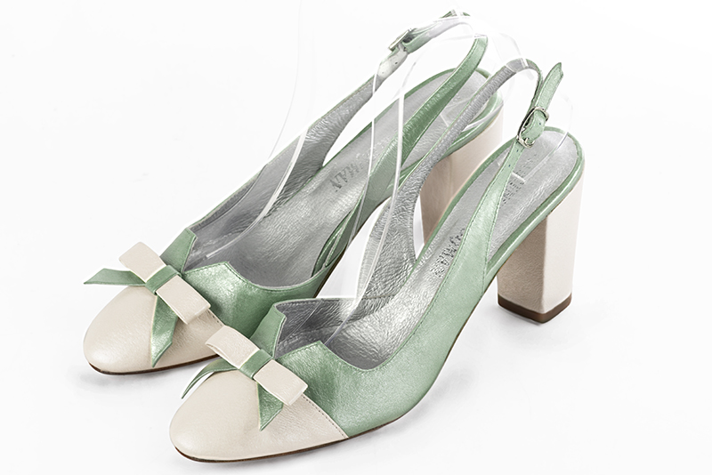 Chaussure femme à brides :  couleur blanc cassé et vert pastel. Bout rond. Talon haut bottier Vue avant - Florence KOOIJMAN