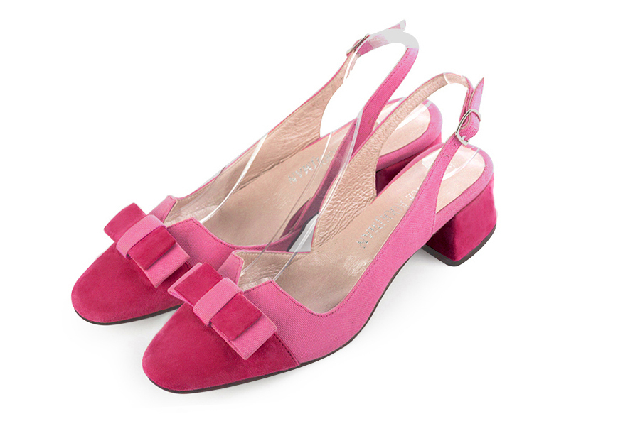 Escarpins bride arrière avec un noeud rose fuchsia et rose pétunia. Bout rond. Talon évasé de 3.5 cm - Vue avant