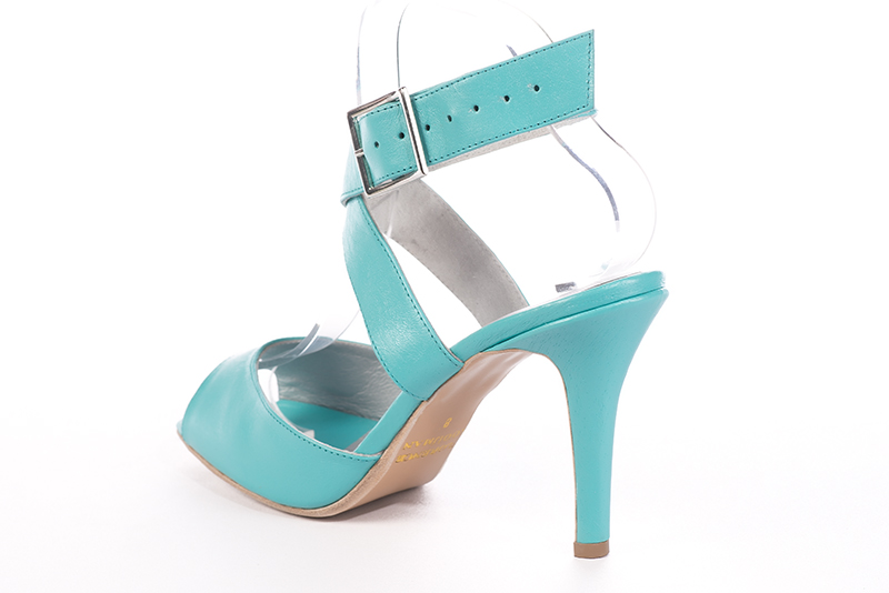 Sandale femme : Sandale soirées et cérémonies couleur bleu turquoise. Bout rond. Talon haut fin. Vue arrière - Florence KOOIJMAN