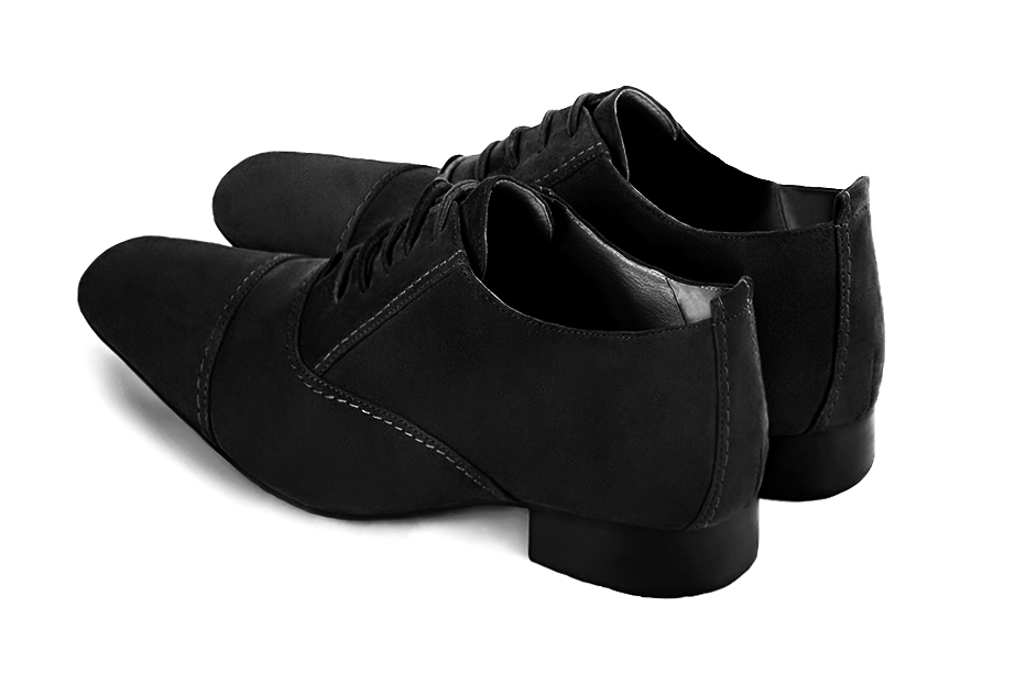 Chaussures homme à lacets type derbies ou richelieux :  couleur noir mat.. Bout rond. Semelle cuir talon plat. Vue arrière - Florence KOOIJMAN