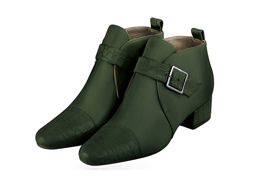 Bottines élégantes et raffinées avec des boucles à l'avant, coloris vert bouteille. Bout rond. Mi-haut. Talon bottier. Personnalisation : Choix des cuirs, des couleurs et des talons. Cou-de-pied sur mesure. - Florence KOOIJMAN