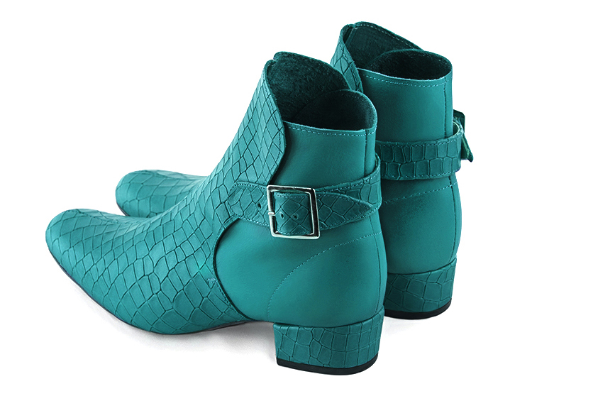 Boots femme : Boots avec des boucles à l'arrière couleur bleu turquoise. Bout rond. Petit talon bottier. Vue arrière - Florence KOOIJMAN