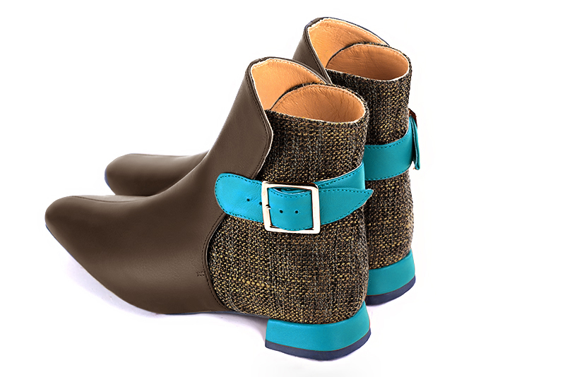 Bottines élégantes et raffinées avec des boucles à l'arrière, coloris marron ébène et bleu turquoise. Bout carré. Plat. Talon évasé. Personnalisation : Choix des cuirs, des couleurs et des talons. Cou-de-pied sur mesure. - Florence KOOIJMAN