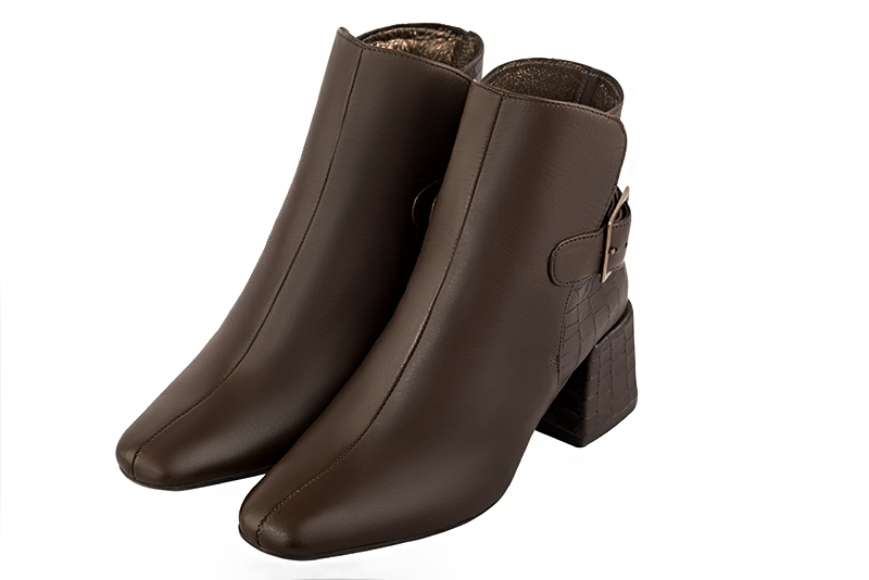 Bottines élégantes et raffinées avec des boucles à l'arrière, coloris marron ébène. Bout carré. Mi-haut à haut. Talon bottier. Personnalisation : Choix des cuirs, des couleurs et des talons. Cou-de-pied sur mesure. - Florence KOOIJMAN