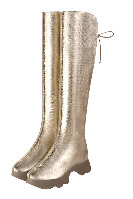 Botte femme : Bottes femme avec des lacets arrières sur mesures couleur or doré. Bout rond. Semelle gomme petit talon. Vue avant - Florence KOOIJMAN
