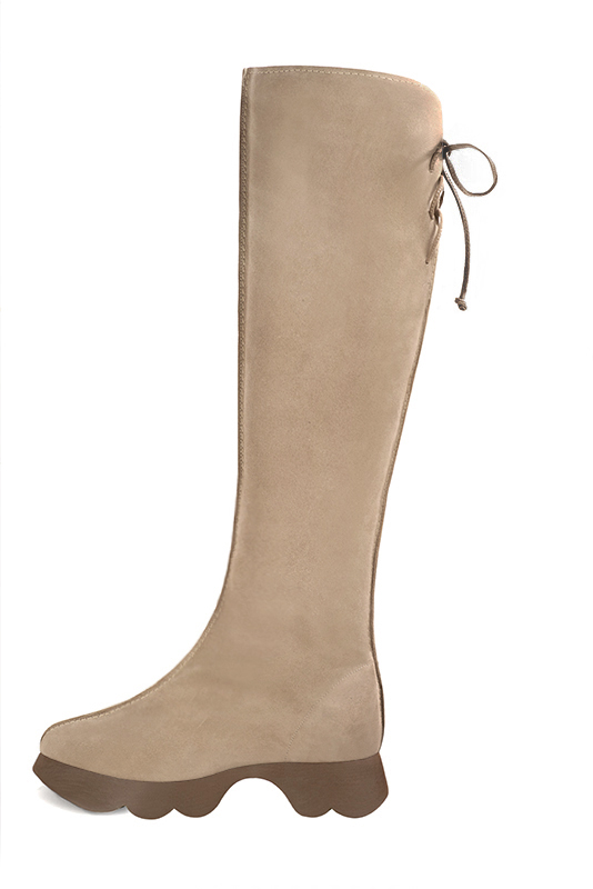 Botte femme : Bottes femme avec des lacets arrières sur mesures couleur beige biscuit. Bout rond. Semelle gomme petit talon. Vue de profil - Florence KOOIJMAN