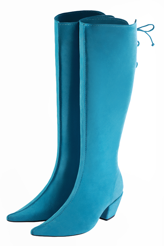 Bottes femme élégantes et raffinées, avec des lacets à l'arrière, réalisées sur mesure, coloris bleu turquoise. Bout pointu. Talon mi-haut bottier. Mollets fins ou larges. Personnalisation : Choix des cuirs, des couleurs et des talons. - Florence KOOIJMAN