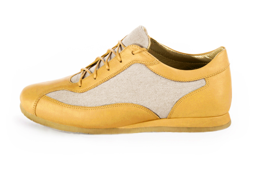 Basket femme habillée : Sneaker urbain bicolore couleur jaune ocre et beige naturel. Semelle fine. Doublure cuir. Vue de profil - Florence KOOIJMAN