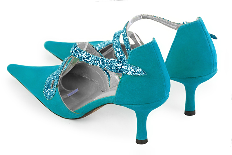 Chaussure femme à brides : Chaussure côtés ouverts bride serpent couleur bleu turquoise. Bout pointu. Talon haut fin. Vue arrière - Florence KOOIJMAN