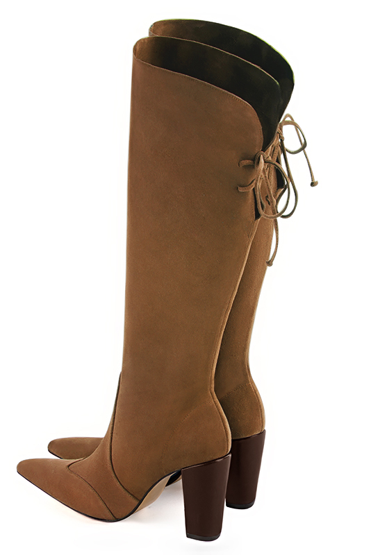 Bottes femme élégantes et raffinées, avec des lacets à l'arrière, réalisées sur mesure, coloris marron caramel. Bout effilé. Très haut. Talon bottier. Mollets fins ou larges. Personnalisation : Choix des cuirs, des couleurs et des talons. - Florence KOOIJMAN