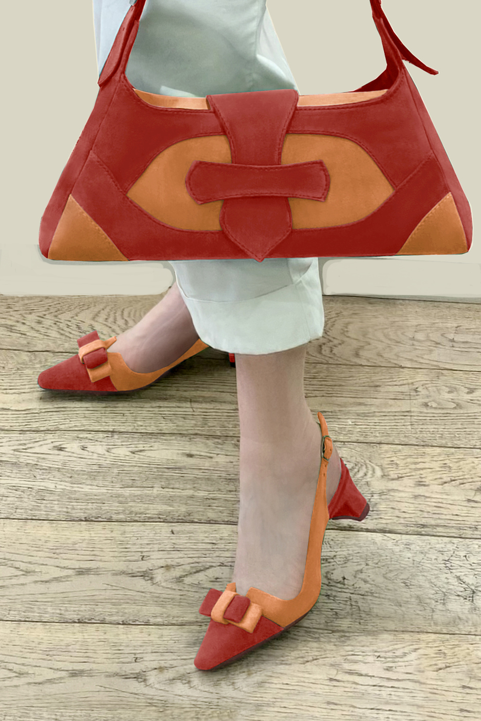 Sac à main habillé en cuir rouge coquelicot et orange abricot - Vue porté