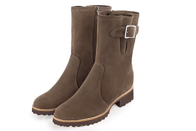 Bottines femme boucles sur les côtés marron chocolat. Bout rond. Semelle en gomme - Vue avant