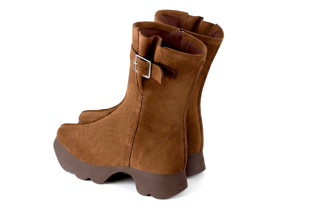 Bottines avec un zip intérieur pour femme en cuir cognac avec bout rond et semelle épaisse et sculpturale en gomme - Vue arrière