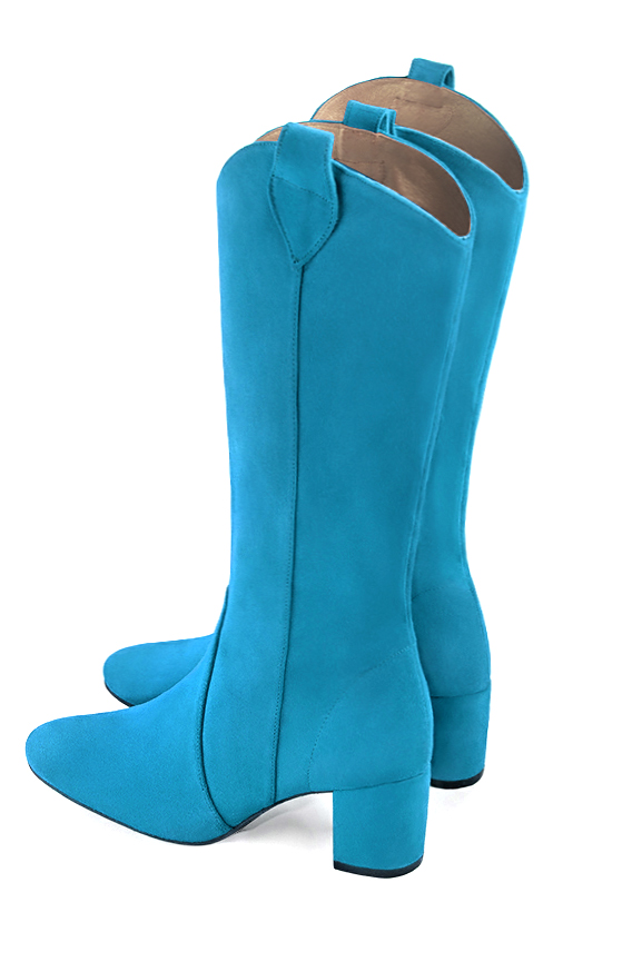 Mi-botte femme :  couleur bleu turquoise. Bout rond. Talon mi-haut bottier. Vue arrière - Florence KOOIJMAN