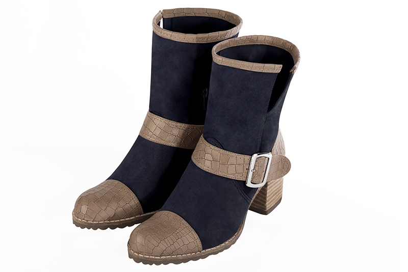 Bottines élégantes et raffinées avec des boucles sur le côté, coloris beige mastic et bleu marine. Bout rond. Mi-haut à haut. Talon bottier. Personnalisation : Choix des cuirs, des couleurs et des talons. Cou-de-pied sur mesure. - Florence KOOIJMAN