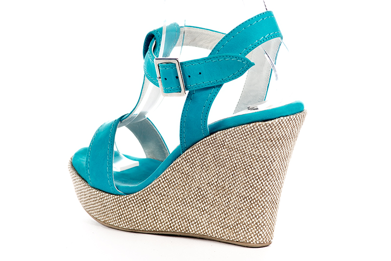 Sandale femme : Sandale soirées et cérémonies couleur bleu turquoise. Bout rond. Semelle compensée talon très haut. Vue arrière - Florence KOOIJMAN