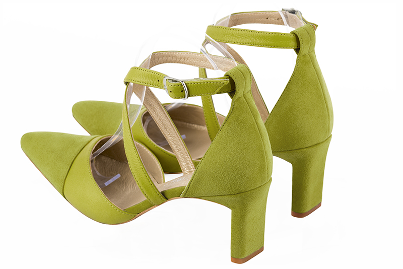 Chaussure femme à brides : Chaussure côtés ouverts brides croisées couleur vert pistache. Bout effilé. Talon mi-haut virgule. Vue arrière - Florence KOOIJMAN