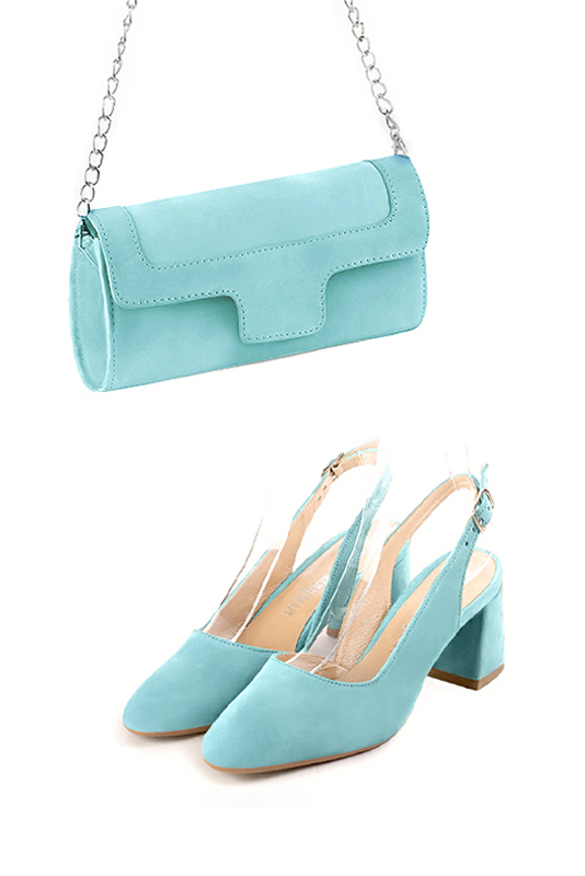 Pochette femme mariage cérémonie en cuir bleu lagon - Vue porté