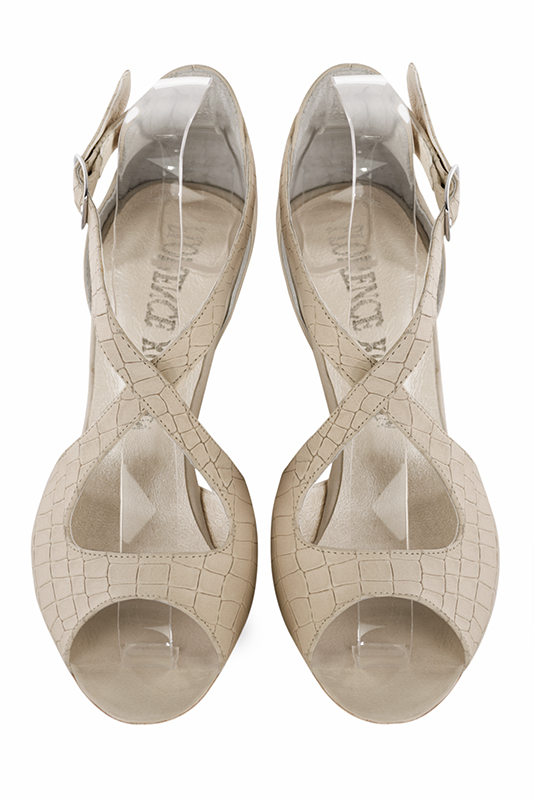 Sandale femme : Sandale soirées et cérémonies couleur blanc ivoire. Bout rond. Petit talon virgule. Vue du dessus - Florence KOOIJMAN