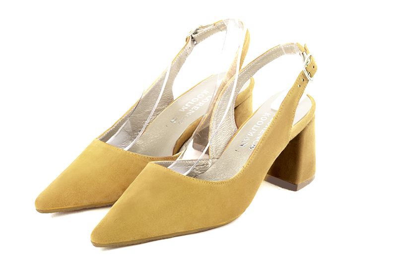 , coloris jaune ocre. Bout pointu. Mi-haut à haut. Talon évasé. Cérémonie, soirée, cocktail, évènementiel. Personnalisation : Choix des cuirs, 
                des couleurs et des talons. Petites et grandes pointures. - Florence KOOIJMAN