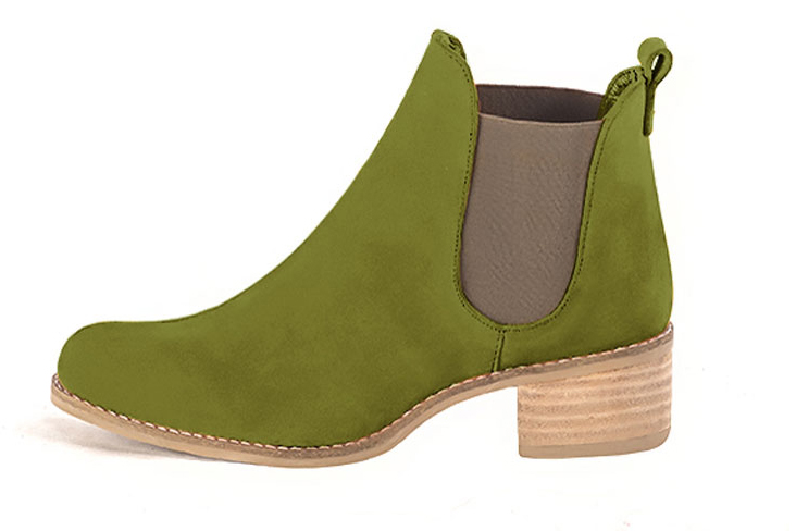 Boots femme : Boots élastiques sur les côtés couleur vert pistache et beige mastic. Bout rond. Semelle cuir petit talon. Vue de profil - Florence KOOIJMAN