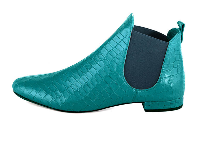 Boots femme : Boots élastiques sur les côtés couleur bleu turquoise. Bout rond. Talon plat bottier. Vue de profil - Florence KOOIJMAN
