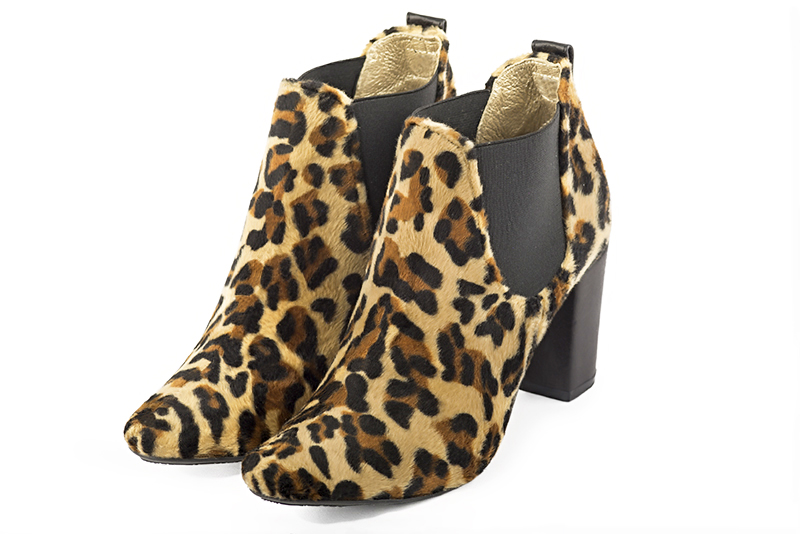 Bottines élégantes et raffinées avec des élastiques sur les côtés, coloris noir. Bout rond. Haut. Talon bottier. Personnalisation : Choix des cuirs, des couleurs et des talons. Cou-de-pied sur mesure. - Florence KOOIJMAN