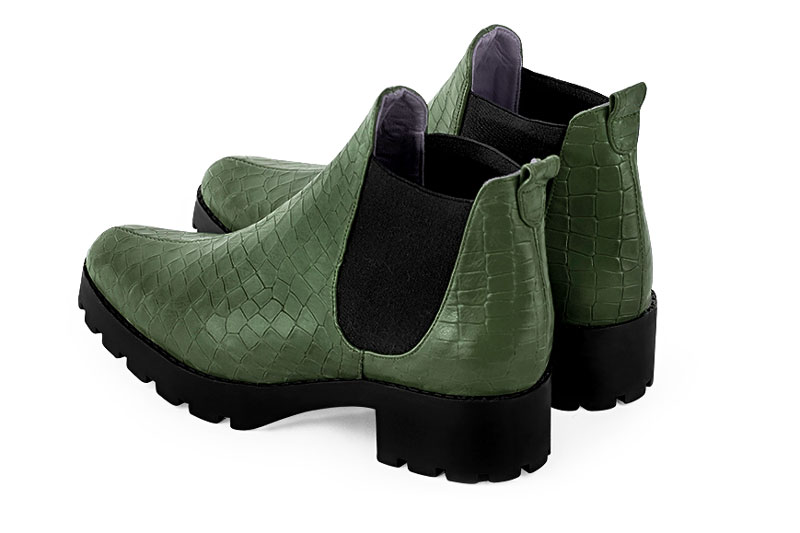 Boots femme : Boots élastiques sur les côtés couleur vert bouteille et noir mat. Bout rond. Semelle gomme petit talon. Vue arrière - Florence KOOIJMAN