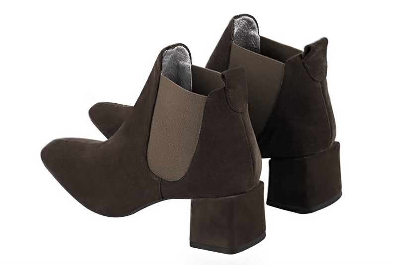 Bottines élégantes et raffinées avec des élastiques sur les côtés, coloris marron ébène. Bout carré. Mi-haut à haut. Talon bottier. Personnalisation : Choix des cuirs, des couleurs et des talons. Cou-de-pied sur mesure. - Florence KOOIJMAN