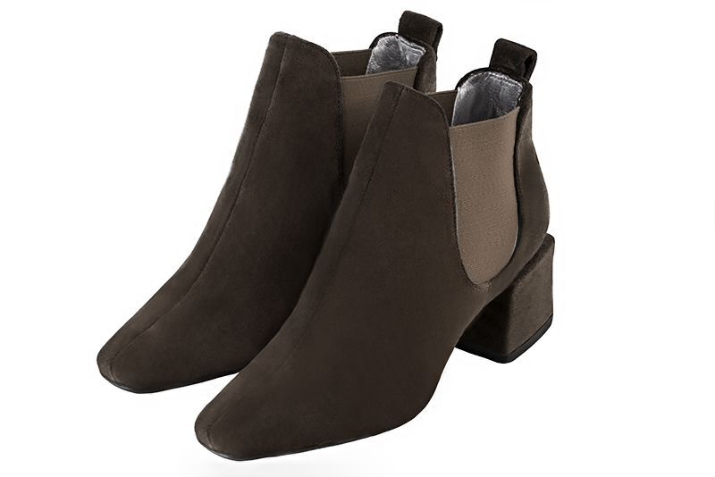 Bottines élégantes et raffinées avec des élastiques sur les côtés, coloris marron ébène. Bout carré. Mi-haut à haut. Talon bottier. Personnalisation : Choix des cuirs, des couleurs et des talons. Cou-de-pied sur mesure. - Florence KOOIJMAN