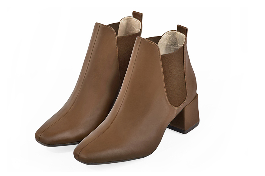Boots femme : Boots élastiques sur les côtés couleur marron caramel. Bout carré. Talon mi-haut bottier Vue avant - Florence KOOIJMAN