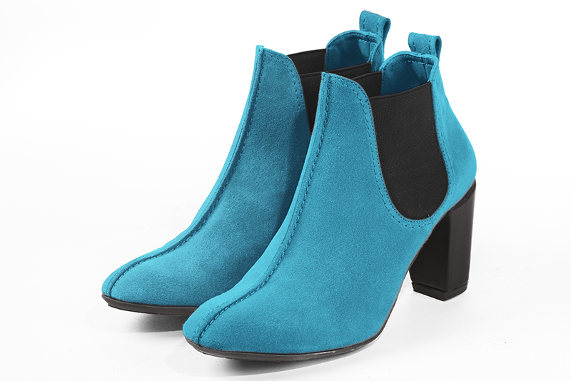 Boots élégantes et raffinées avec des élastiques sur les côtés, coloris bleu turquoise et noir. Bout rond. Talon haut bottier. Personnalisation : Choix des cuirs, des couleurs et des talons. Cou-de-pied sur mesure. - Florence KOOIJMAN