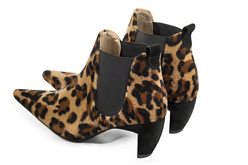Boots femme : Boots élastiques sur les côtés couleur noir safari. Bout pointu. Talon mi-haut virgule. Vue arrière - Florence KOOIJMAN